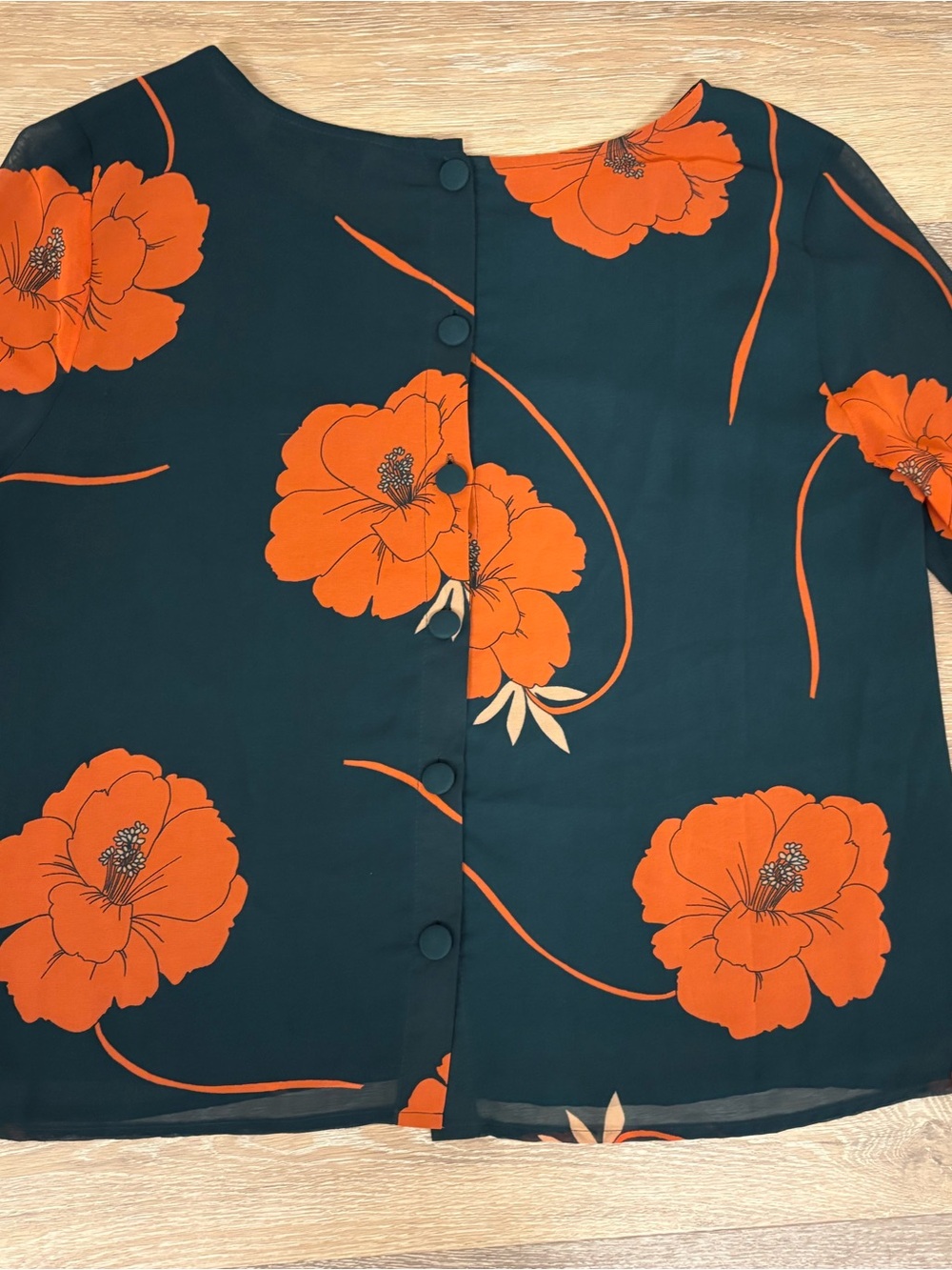 Cupcakes & Cashmere Dark Teal Floral Blouse with Orange Poppies